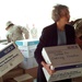 Gen. Myers' Wife Helps Distribute Cookies to Troops Overseas