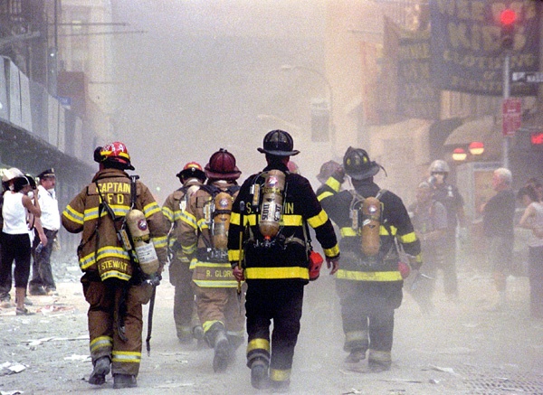 Firefighters Brave Dust and Smoke at Ground Zero on 9/11