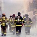 Firefighters Brave Dust and Smoke at Ground Zero on 9/11