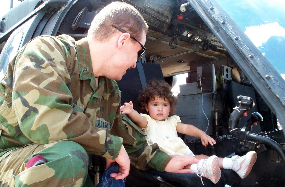 Army Chief Warrant Officer Shares Helicopter Experience with Daughter