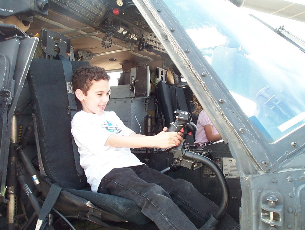 Young Air Force Son Plays Pilot at Joint Service Open House