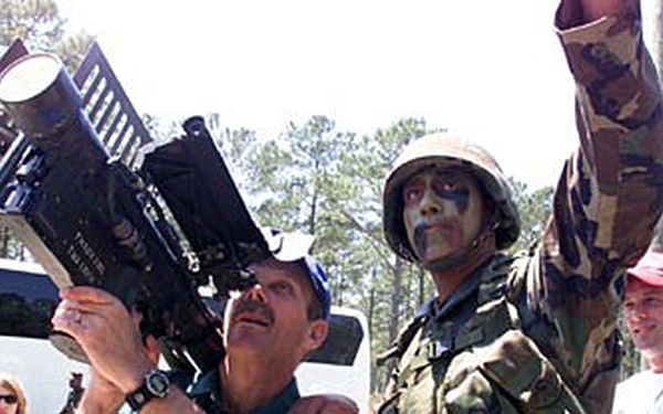 Civilian Businessman Gets Hands-On with Stinger Missile at Military Base