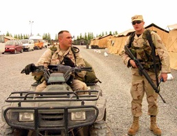 Air Force Officer Confers with Sergeant at Kyrgyzstan Base