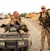 Air Force Officer Confers with Sergeant at Kyrgyzstan Base