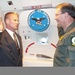 Air Force NCO Re-enlists Aboard Rumsfeld's Plane