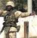 Soldier Directs Traffic at Bagram Air Base in Afghanistan
