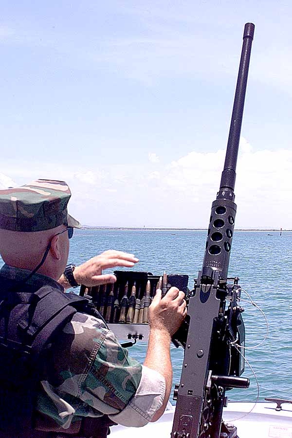 Coast Guard Petty Officer Mans .50-Cal Machine Gun on Patrol Boat at Guantanamo Bay