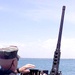 Coast Guard Petty Officer Mans .50-Cal Machine Gun on Patrol Boat at Guantanamo Bay