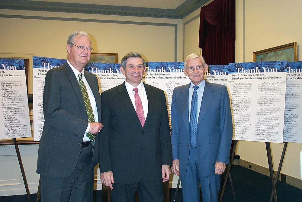 Lawmakers Present &quot;Thank You&quot; Card to Defense Official