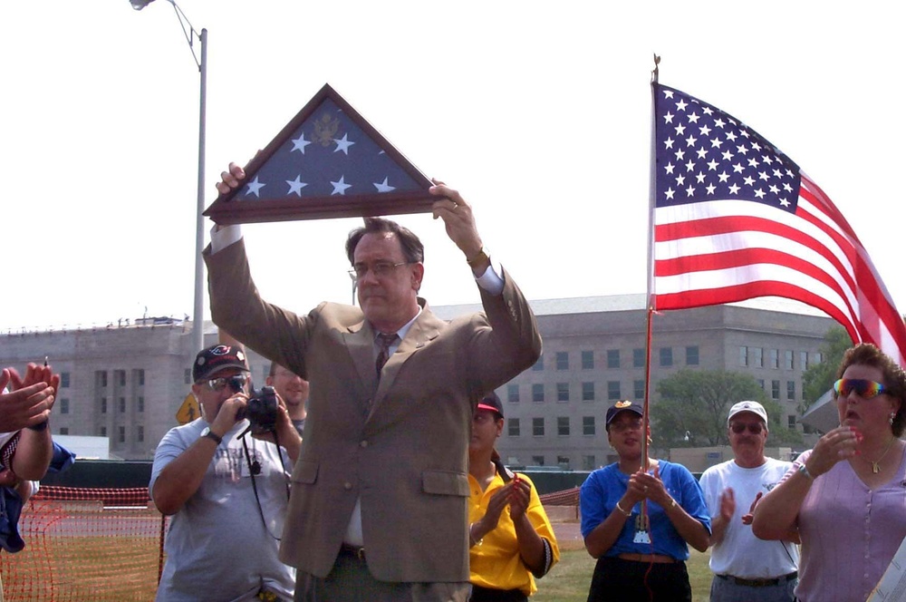 Pentagon Official Presents Flag to Corvette Caravan