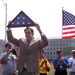 Pentagon Official Presents Flag to Corvette Caravan