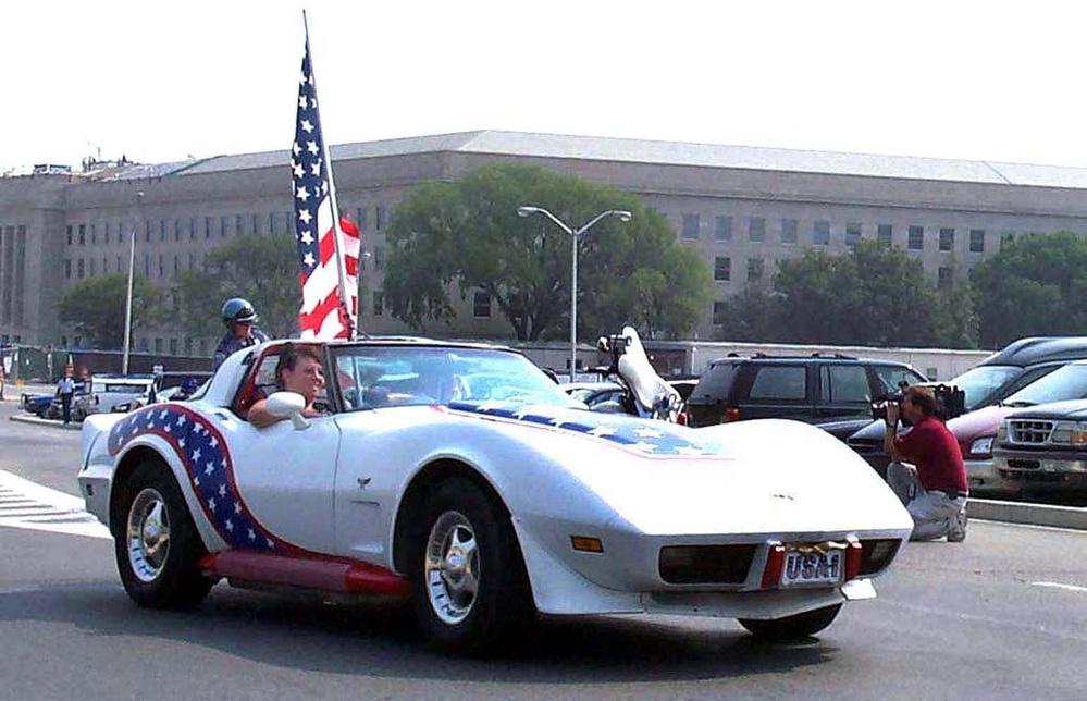 Patriotic Corvette Cruises Past Pentagon in Stars and Stripes Caravan