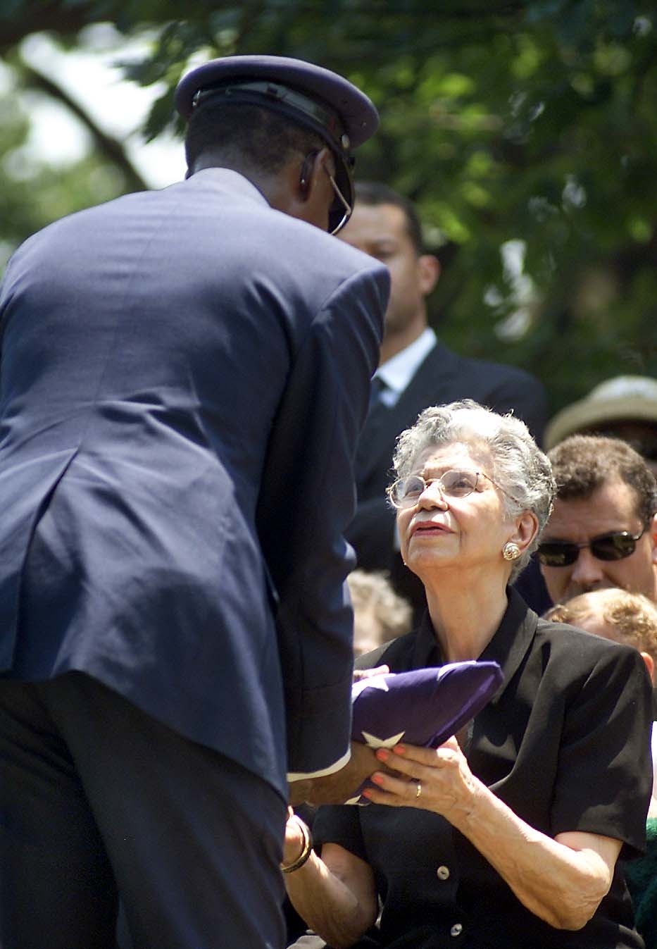 Gen. Lyles Presents Flag to Gen. Davis' Sister at Arlington Funeral