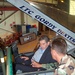 Air Force Officer Explains F-16 Cockpit to Deputy Defense Secretary