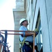 Ironworker Caulks Windows at the Pentagon