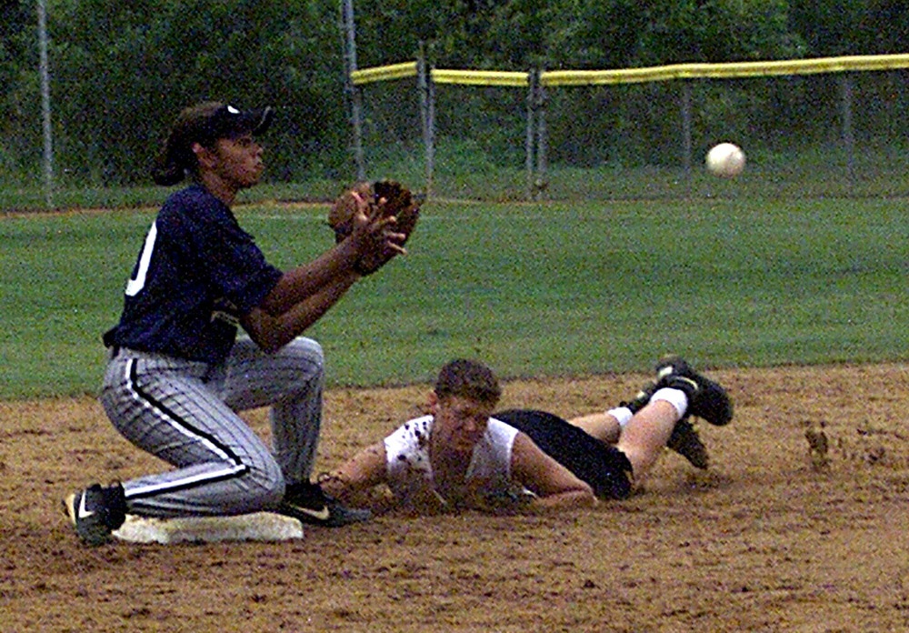 Navy Petty Officer Slides into Second Base at Armed Forces Softball Tournament