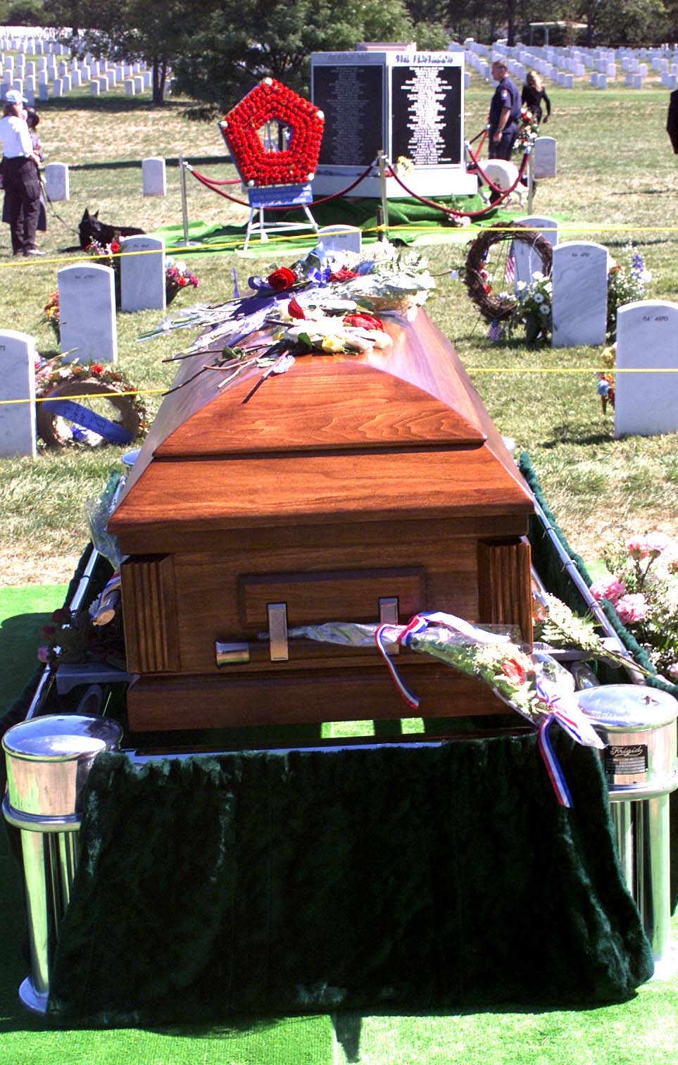 Solemn Remembrance: Casket Bearing 9/11 Pentagon Victims Rests in Arlington National Cemetery