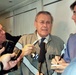Rumsfeld Briefs Reporters Aboard Plane to NATO Meetings
