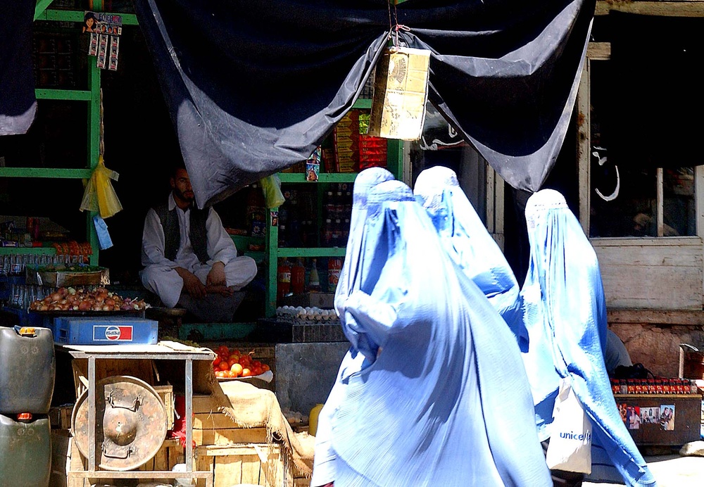 Afghan Women Navigate Bustling Market in Parwan Province