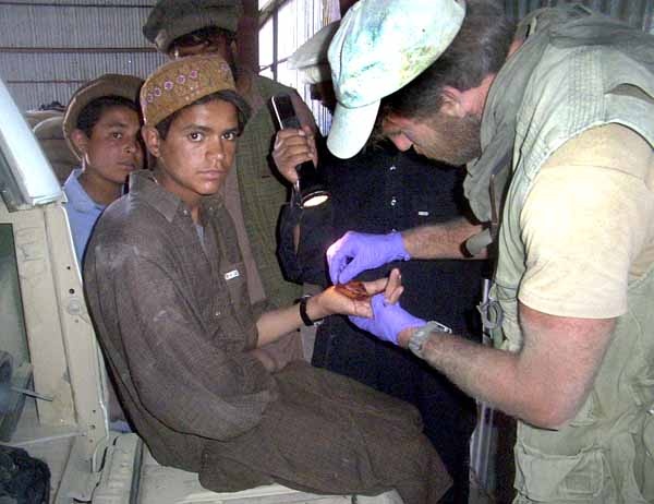 U.S. Army Medic Treats Afghan Boy Bitten by Donkey