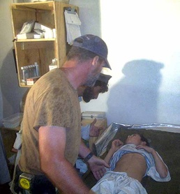 Army Doctor Provides Care to Afghan Child in Hospital