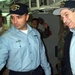 Navy Petty Officer Escorts Defense Official on Ship Tour