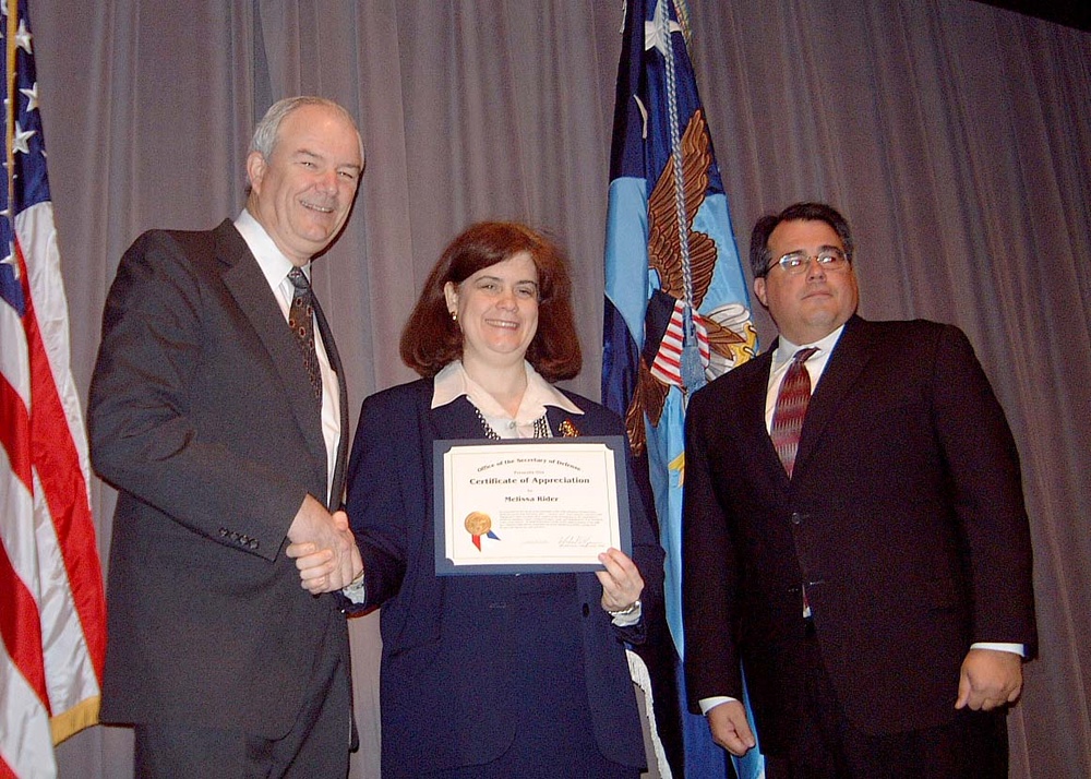 Defense Official Honors Acquisition Specialist for Improving E-Business Practices