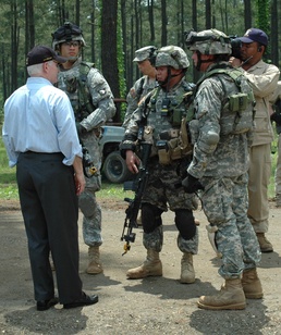 Defense Secretary Gates Visits 101st Airborne Troops in Training Village