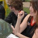 Entertainer Jenny Boyle Signs Helmet for Military Supporters at Pentagon Event