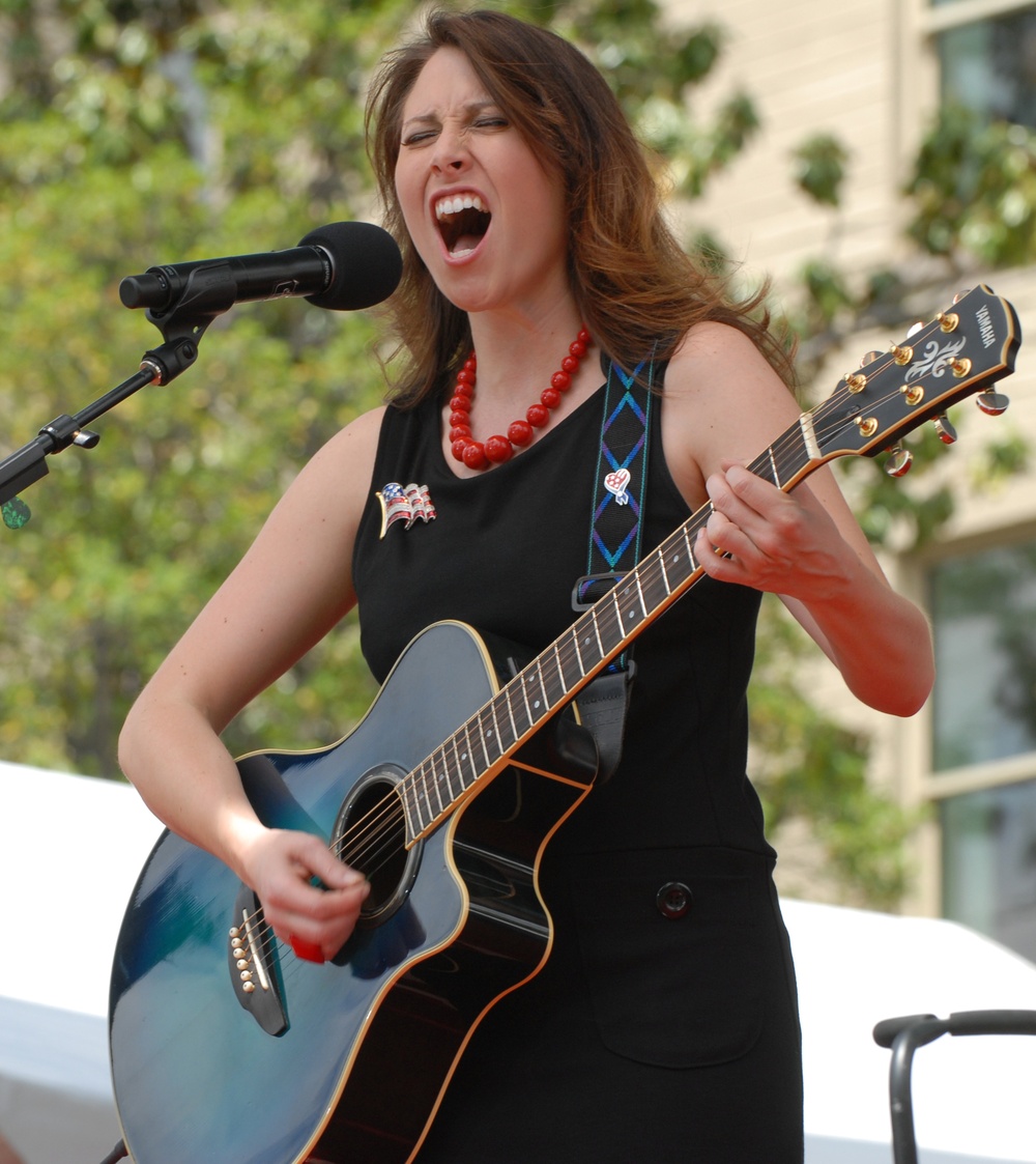 Patriotic Performance: Jenny Boyle Entertains Troops at Pentagon Ceremony