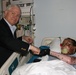 Defense Secretary Gates Visits Wounded Marine at Texas Medical Center