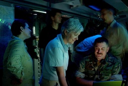 Business, Education Leaders Tour Navy Warship's Combat Center