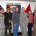 Army Leaders and Celebrity Entertainers Pose for Photo in Iraq