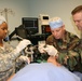 Army, Air Force Captains Practice Intubation at Medical Simulation Center