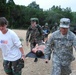 Army Nursing Students Carry Patient Simulator in Trauma Field Training