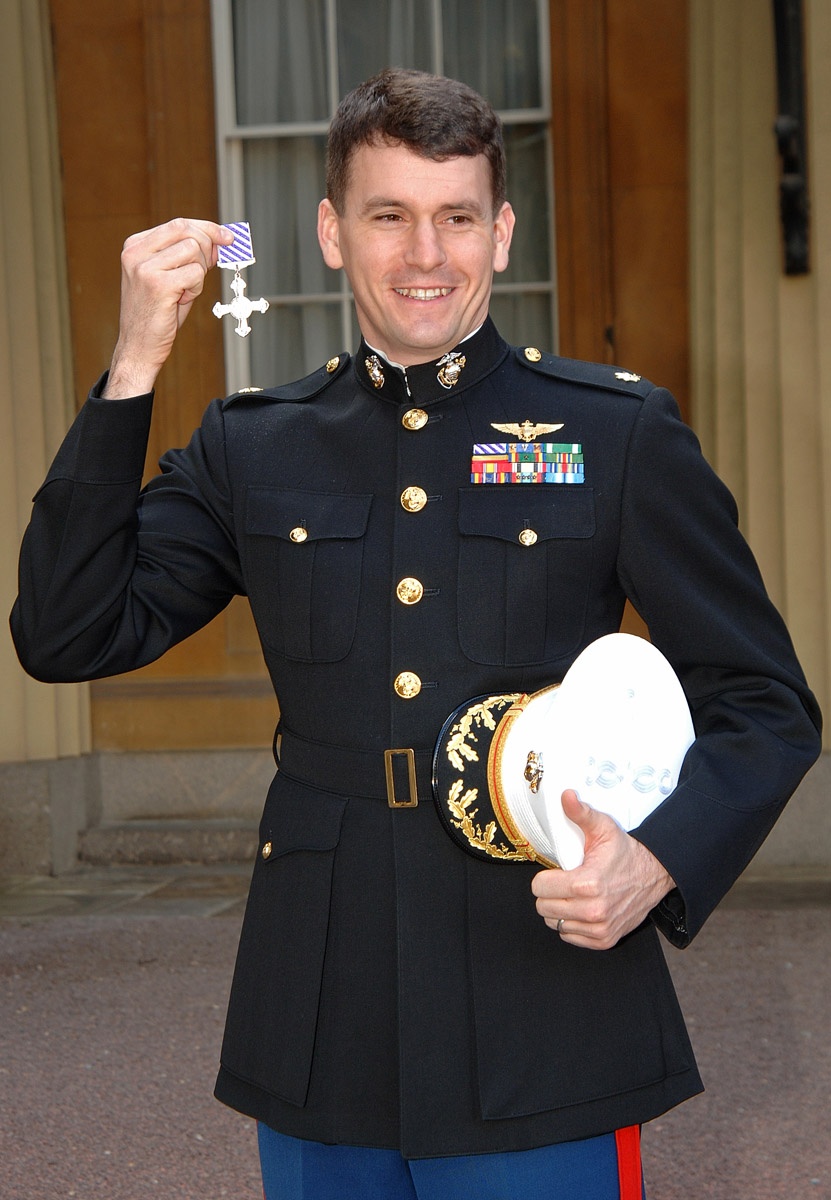 Marine Major Awarded Distinguished Flying Cross by Queen Elizabeth II