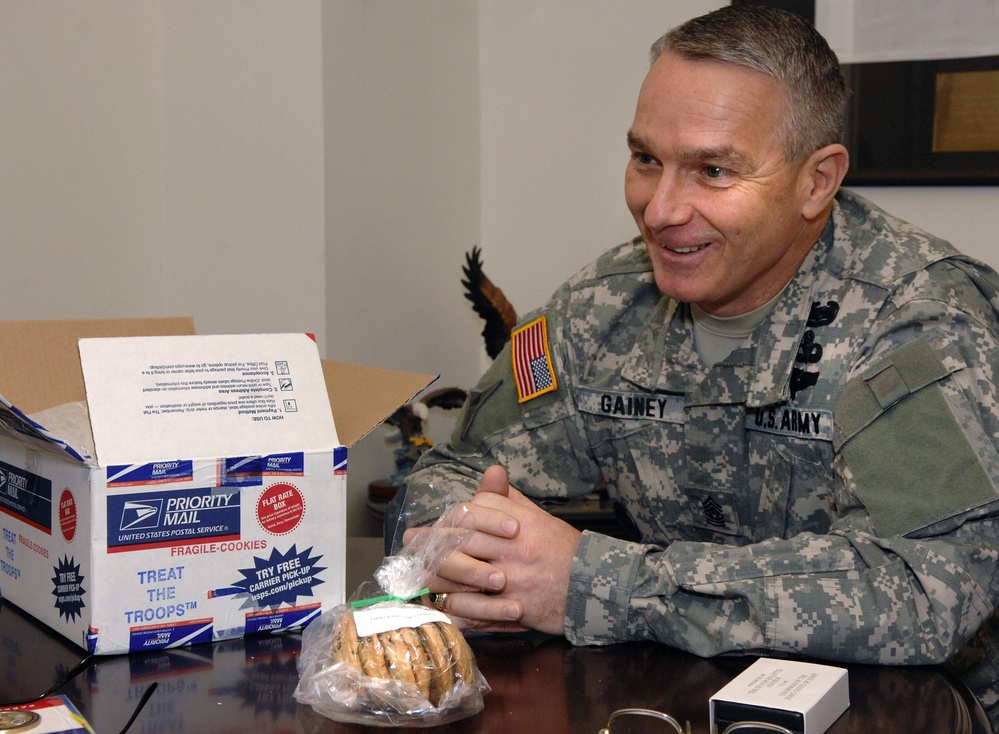 Senior Enlisted Advisor Receives Cookies from Troop Support Organization