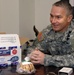 Senior Enlisted Advisor Receives Cookies from Troop Support Organization