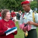 Junior ROTC Student Distributes Flags, Ribbons at America Supports You Rally