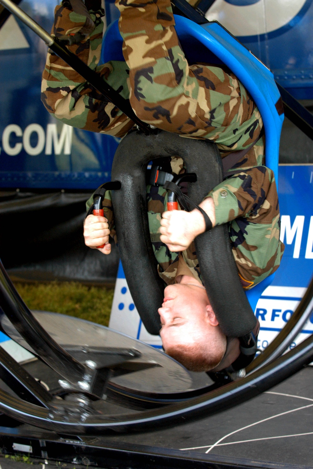 National Guard Soldier Tries Out Air Force Gyroscope Exhibit