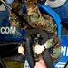 National Guard Soldier Tries Out Air Force Gyroscope Exhibit