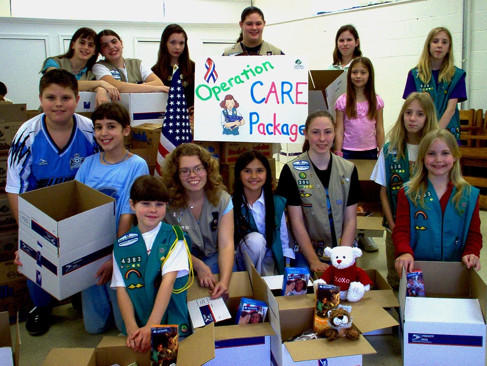 Girl Scouts Pack Cookies for Troops Overseas