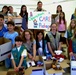 Girl Scouts Pack Cookies for Troops Overseas