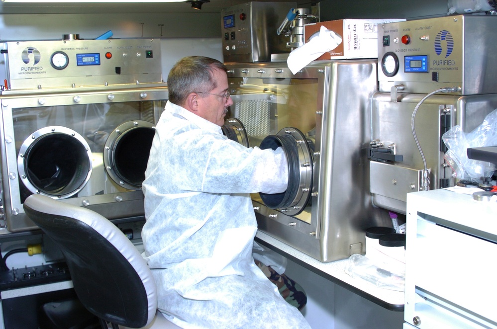 Army Sgt. 1st Class Tests Sample During Arkansas Exercise
