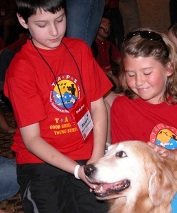 Children Find Comfort in Crisis Response Dog at Survivors' Seminar