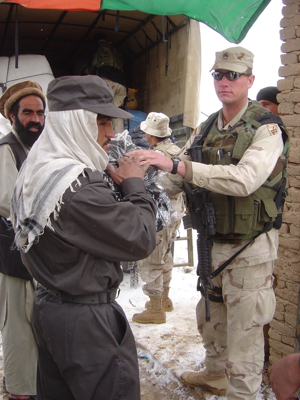 U.S. Soldier Provides Cold-Weather Gear to Afghan Police