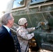 Rumsfeld Visits Troops, Inspects Damaged Armored Vehicle in Iraq