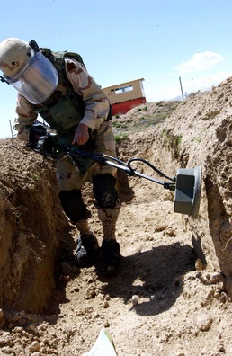 Army Spc. Felife Hernandez Sweeps for Landmines with Handheld Detection System