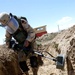Army Spc. Felife Hernandez Sweeps for Landmines with Handheld Detection System