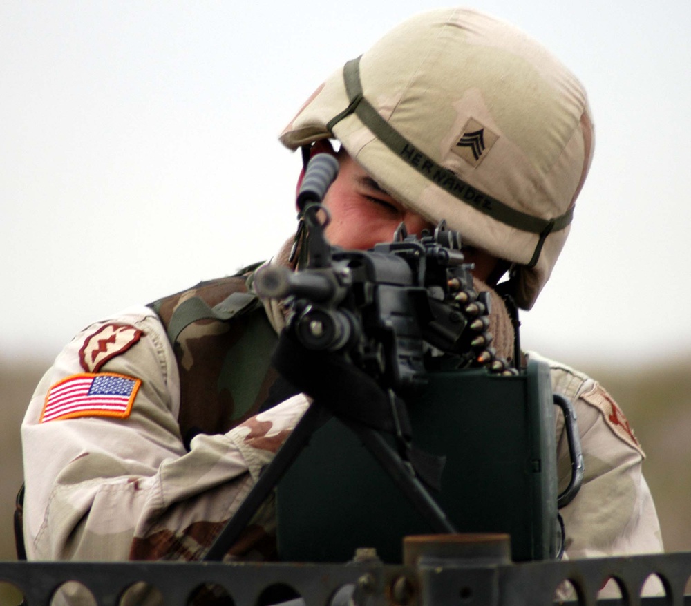 Army Sergeant Trains with Machine Gun at Uzbekistan Air Base
